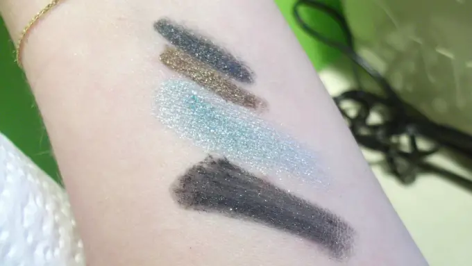 MAC Pigment in Magic Spells, Lucky In Love, and Pearlglide Intense Eyeliners in Lord It Up and Black Swan
