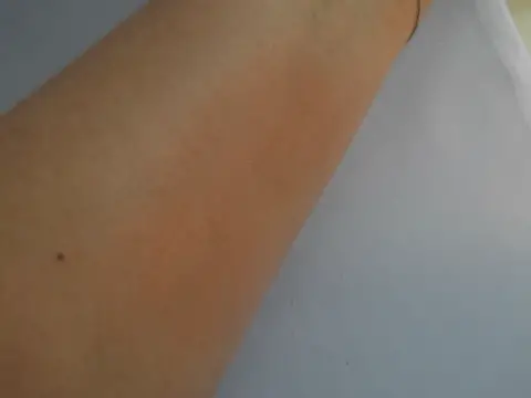 Diorskin Nude Tan Peachy Side
